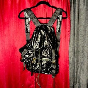 09’ Lesportsac backpack w/ aluminum clasps